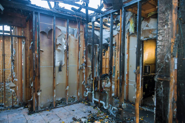 Professional Fire Damage Restoration technician working in Three Bridges, NJ